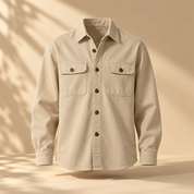 one sand beige cotton twill overshirt, two chest pockets, dark buttons, relaxed fit, invisible mannequin front view, no person