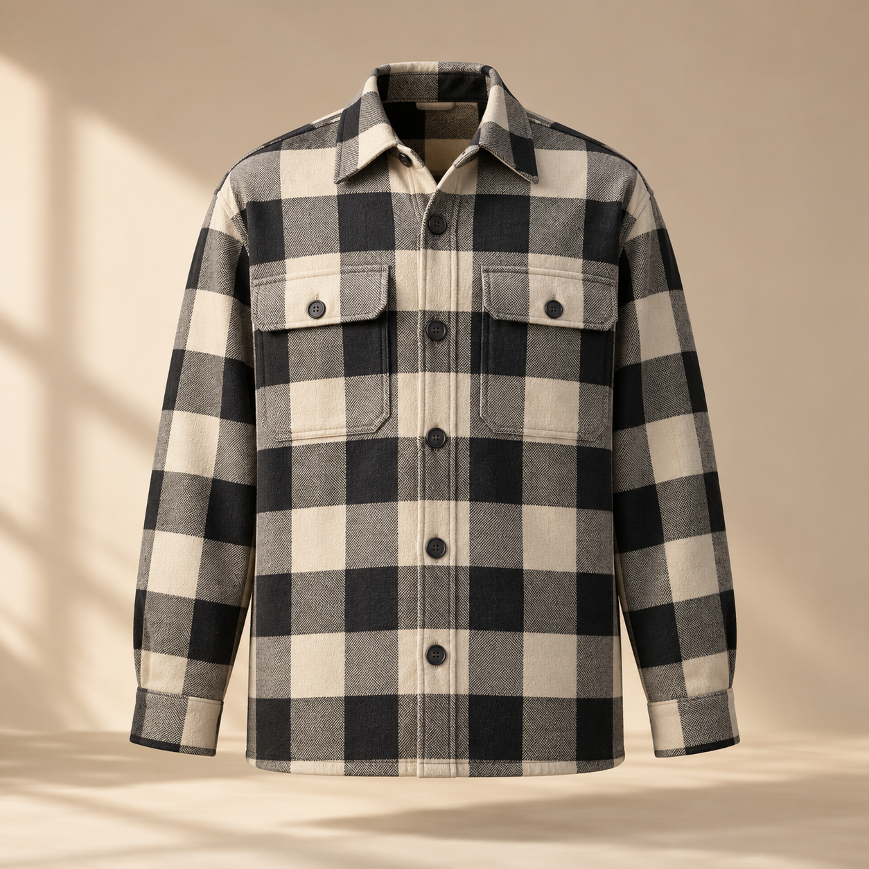 one premium cream and black checkered cotton twill overshirt with two square chest pockets, tonal buttons and relaxed tailored silhouette, invisible mannequin full front view, no person