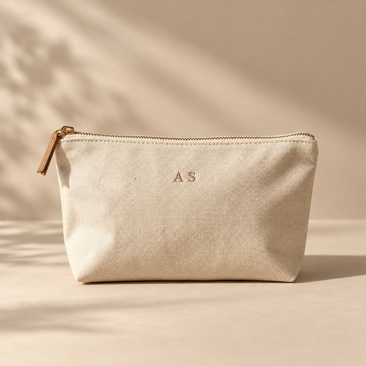 Monogram Pouch — studio product image