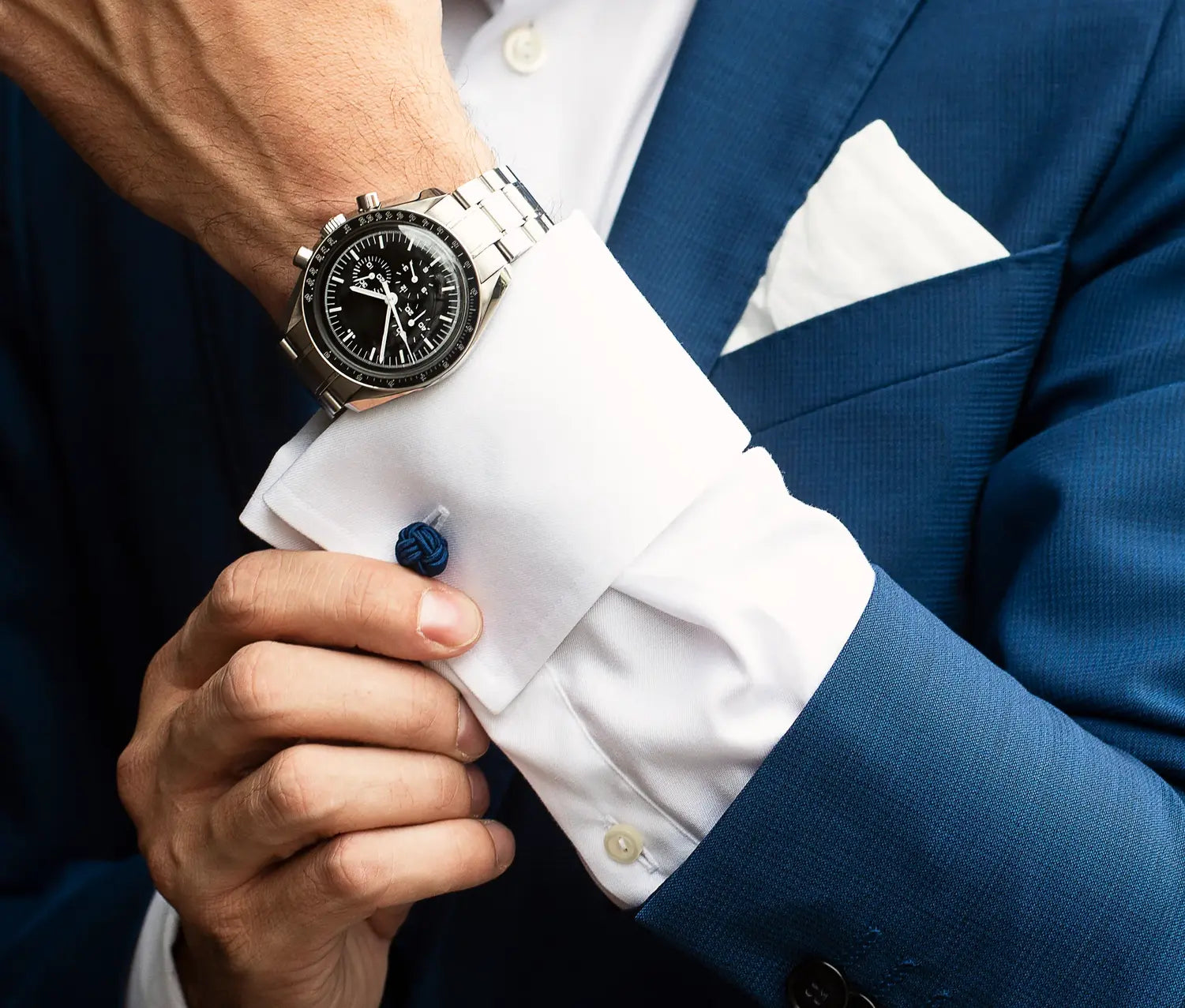 adjusting-french-cuffs-mens-fashion.webp